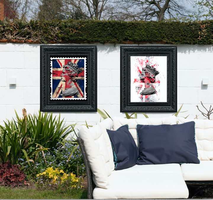 Two first class stamps artworks on a white wall with a garden view