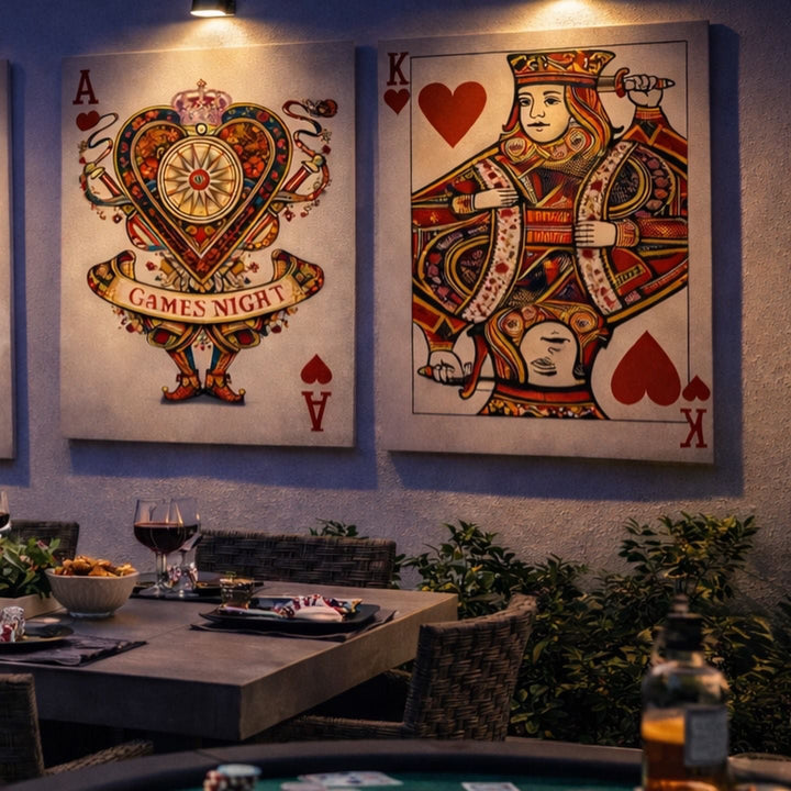 Decorative playing card wall art in a restaurant setting with a table and drinks.