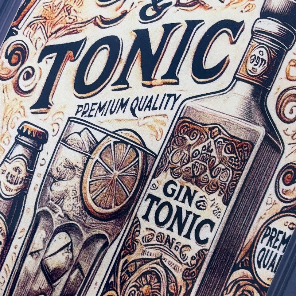 Decorative Gin & Tonic packaging with intricate designs and text.