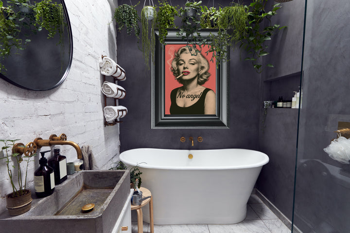 Bathroom Marilyn Art with a freestanding bathtub, poster, and plants.