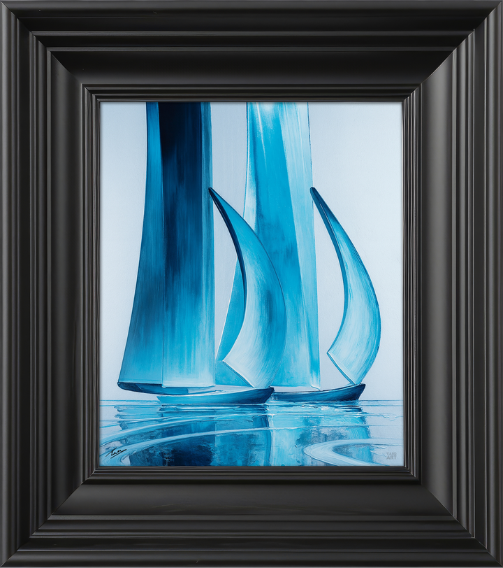 Framed artwork of blue sailboats on a light blue background