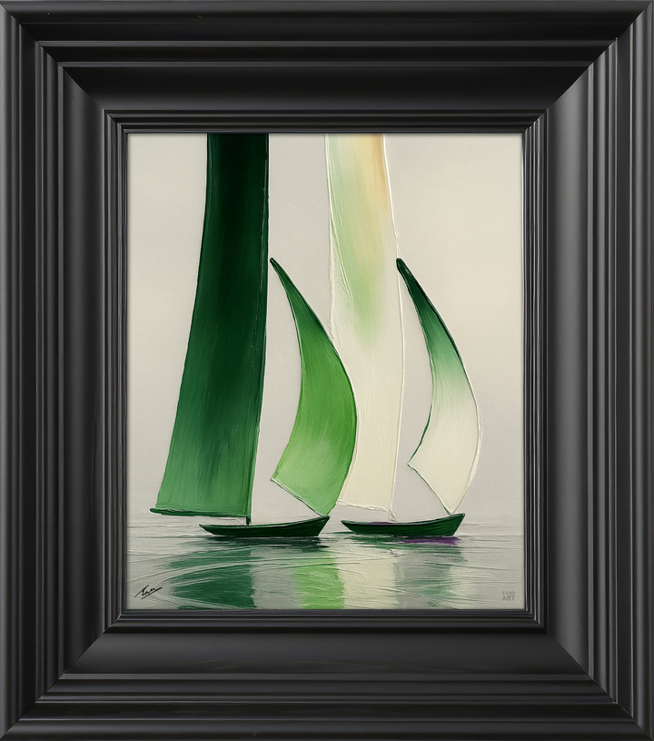 Framed artwork of sailboats with green and white sails.