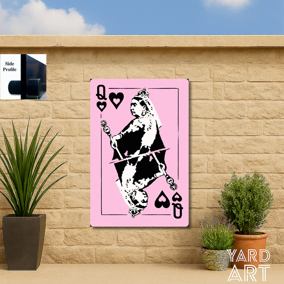 Pink playing card-style artwork of Queen Victoria Queen Of Hearts on a garden wall with plants below.