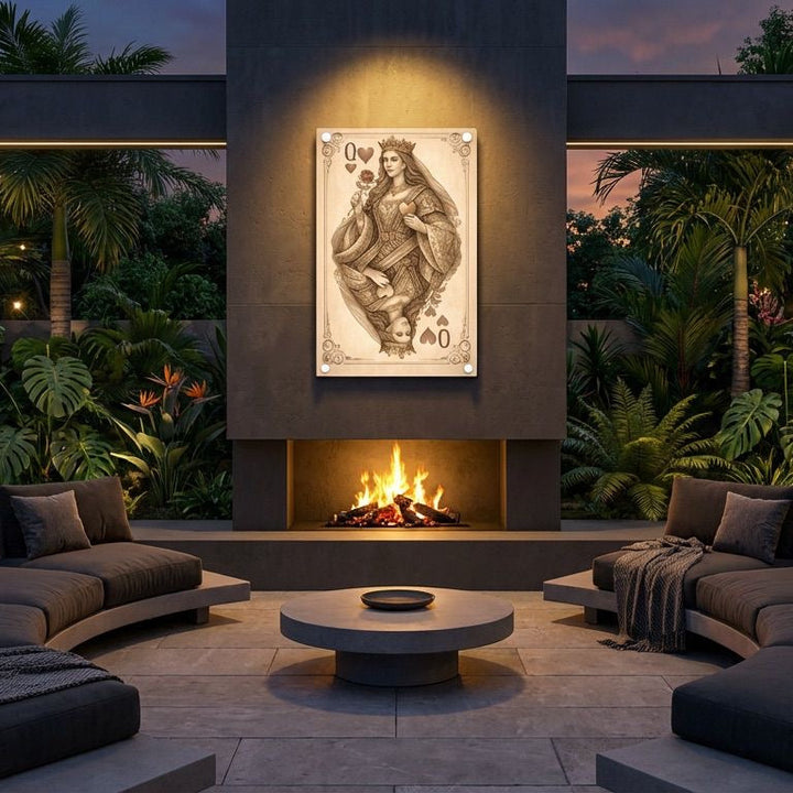 Modern outdoor patio with fire pit, seating area, and decorative wall art.
