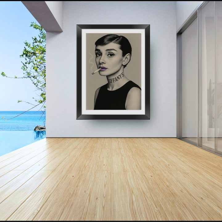 Framed portrait of a Audrey Hepburn smoking inside a modern room with a pool and ocean view.