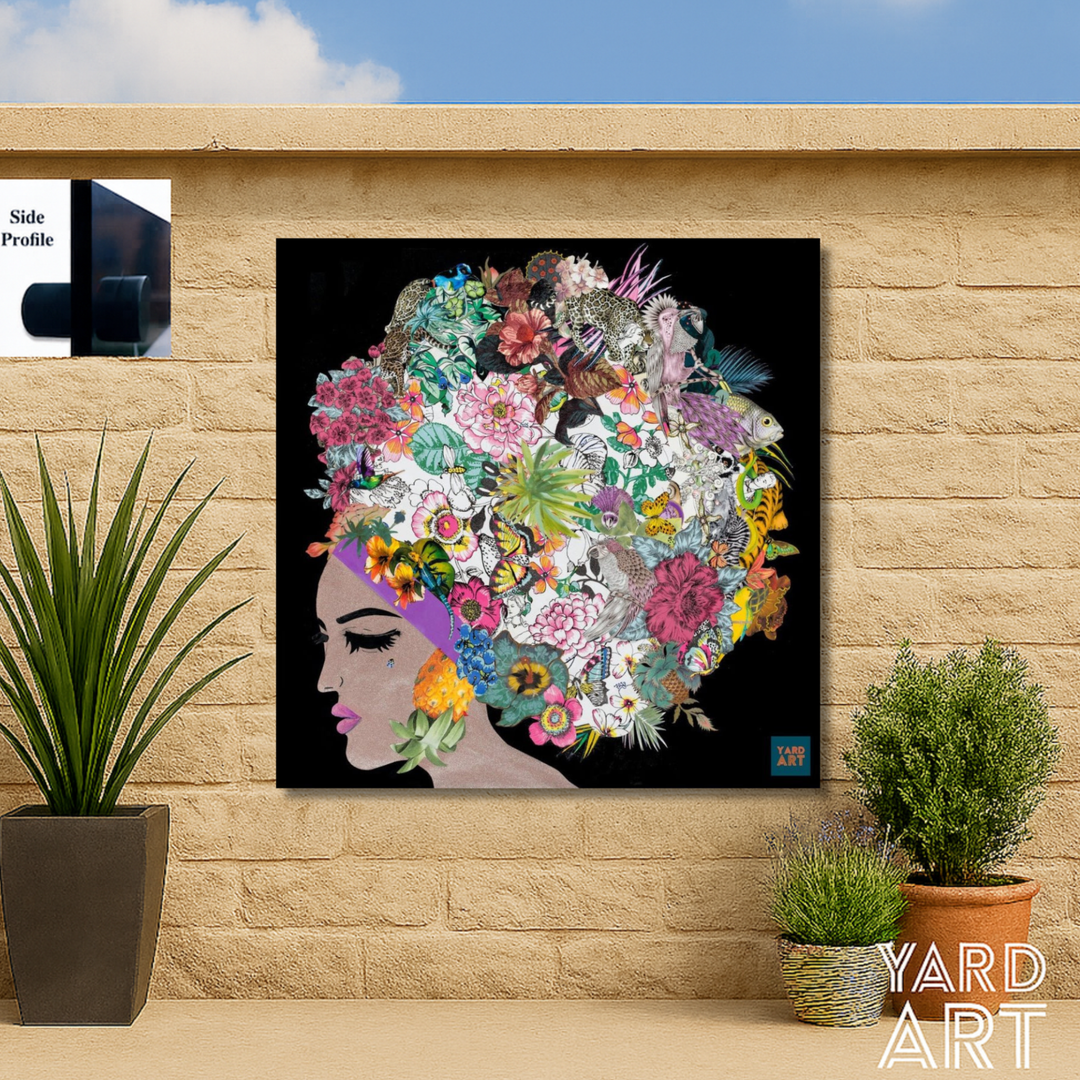 Colorful floral art on a wall with potted plants below