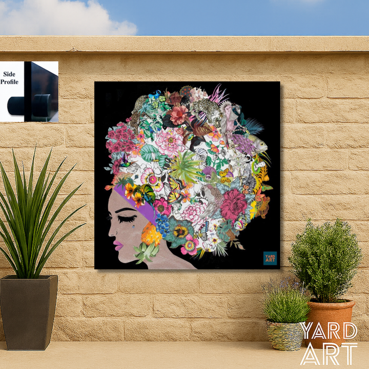 Colorful floral art on a wall with potted plants below