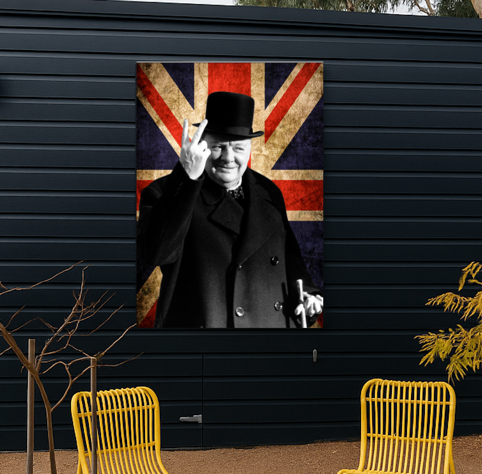 Poster of a man in a top hat with a peace sign against a Union Jack background on a black wall.