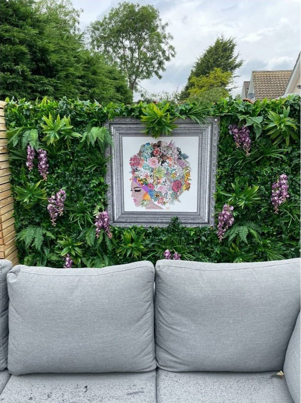 Rosa by Charlotte Clemence - YARDART UK in a garden on foliage wall